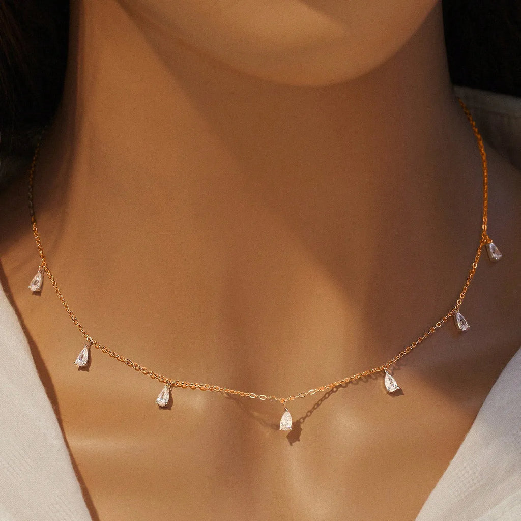 Silver necklace with drop-shaped artificial zircon pendant on adjustable O-shaped chain