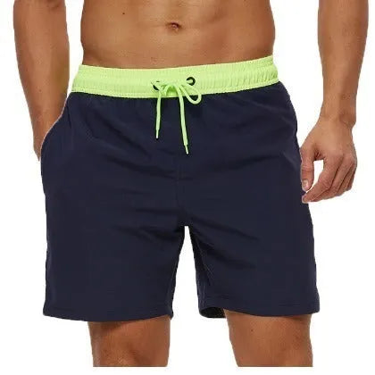 Men's blue athletic shorts with stitching waistband headband pocket and drawstring closure