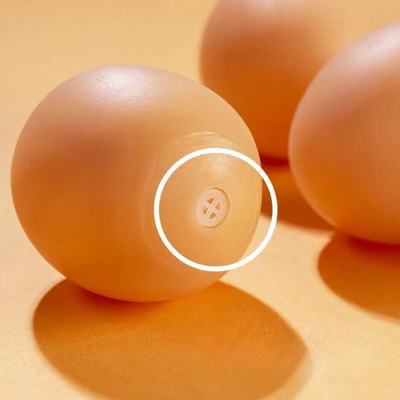 Egg-shaped dog chew toy with textured surfaces for dental cleaning and sound feature