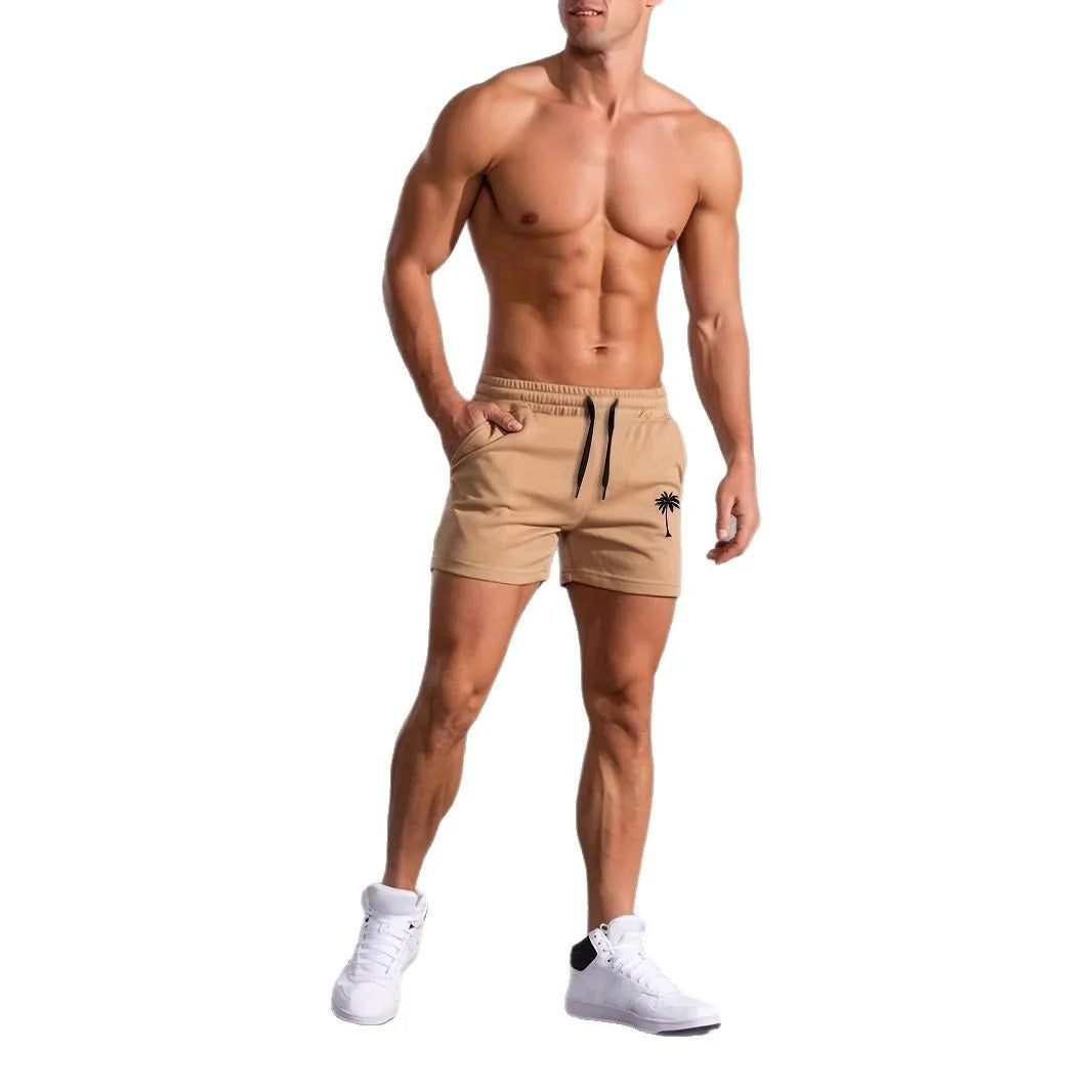 Man wearing khaki coconut print straight-leg sports shorts made of polyester