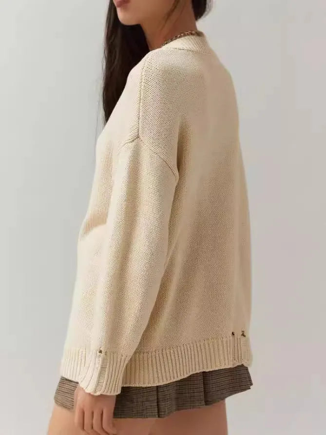 Women's loose-fitting acrylic jacquard knit sweater with round neck and long sleeves