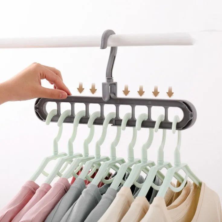 Plastic clothes hanger with storage hook and rotating handle in available colours