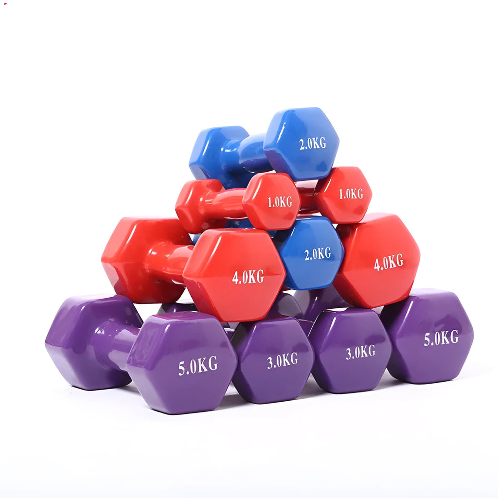 A set of bright colourful plastic dumbbells in different sizes on a light floor.