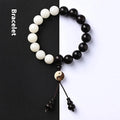 Handmade bodhi seed bracelet with 11mm mixed yuan beads including white palm seeds and carved blackwood elements