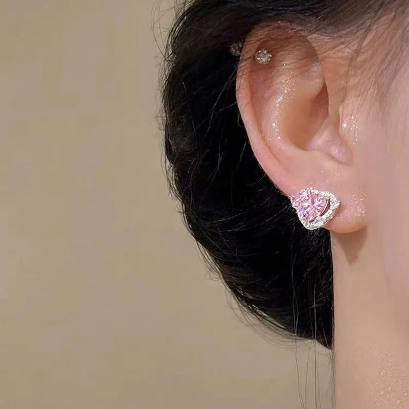 Women's white-k gold electroplated heart-shaped stud earrings with copper base metal