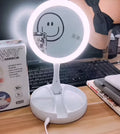 White foldable double-sided LED vanity mirror with USB charging port