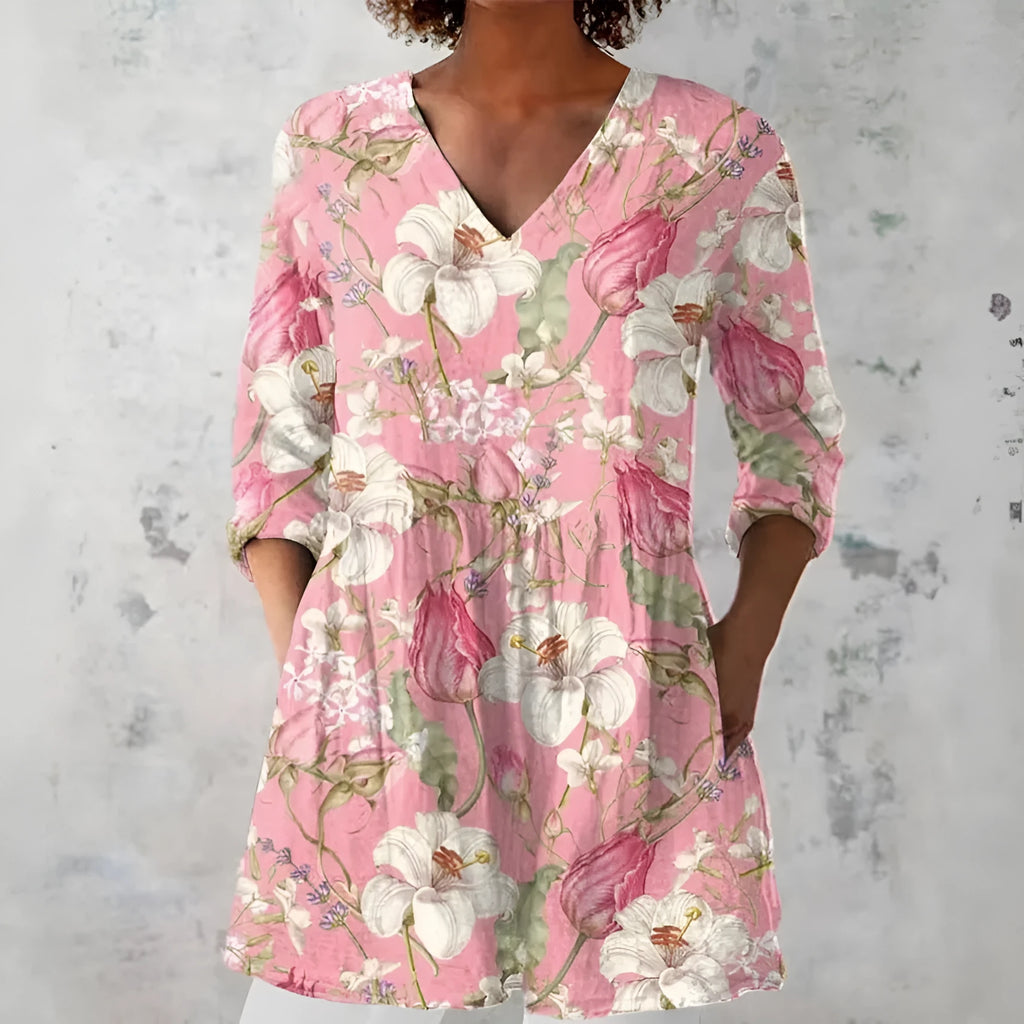 Women's retro style slim fit long-sleeved top with a printed design, shown on a hanger.
