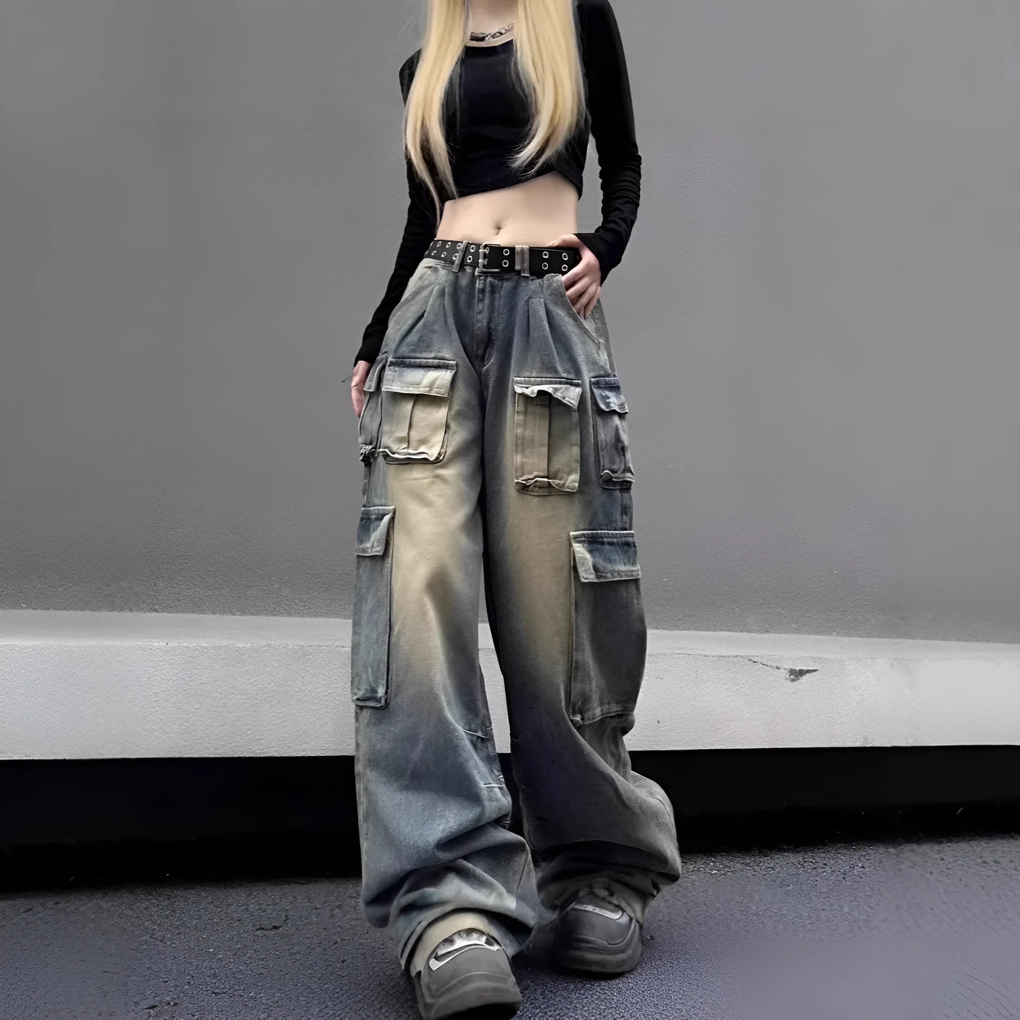 Light blue loose-fit denim jeans with multiple pockets and distressed finish