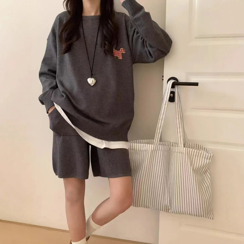 Women's milk blue casual knitted sweater and shorts suit with animal pattern embroidery.