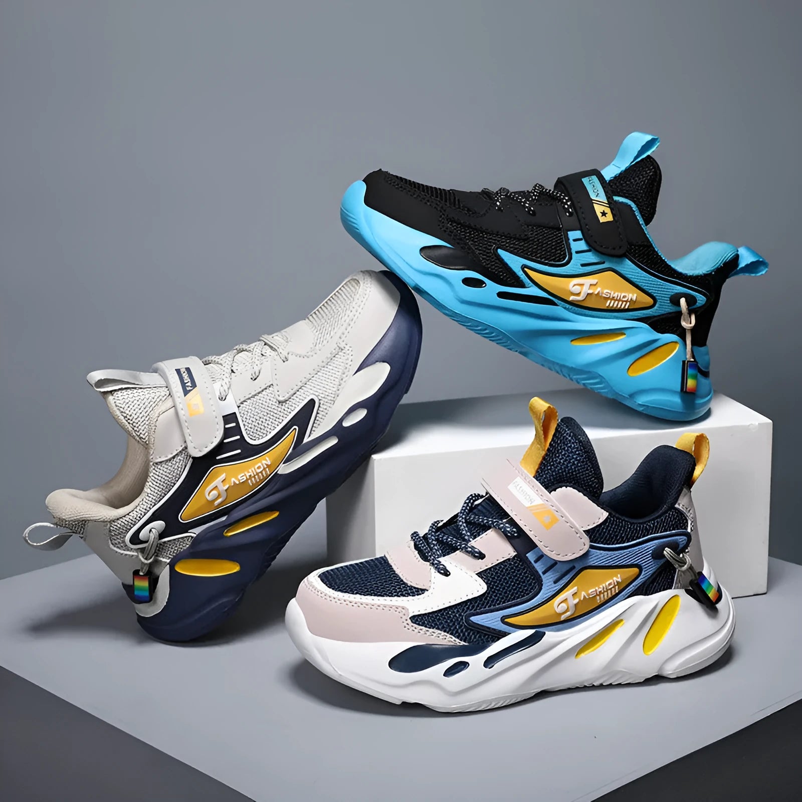 Boys' dark blue and black platform sports shoes with Velcro strap and mesh upper.