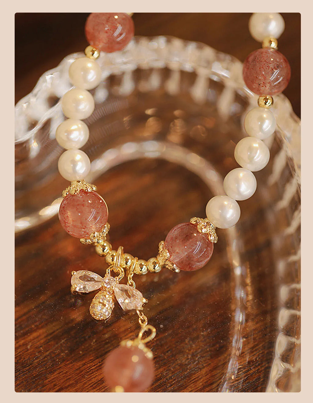 Women's strawberry quartz bracelet with stringed pearls and bow detail in INS style