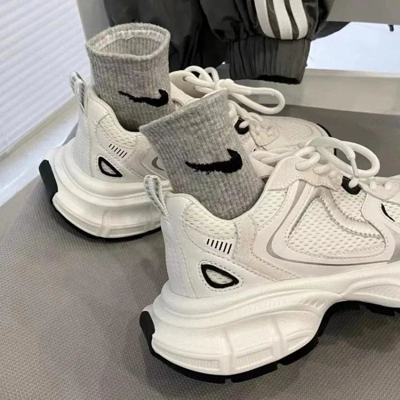 Beige mesh sports shoes with wedge heel platform and front lace-up fastening
