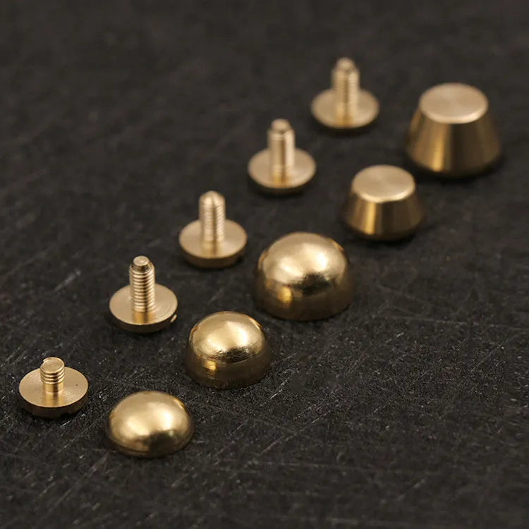 Brass decorative buckle foot nails in round and geometry bucket designs, sizes 10x6mm and 12x7mm.