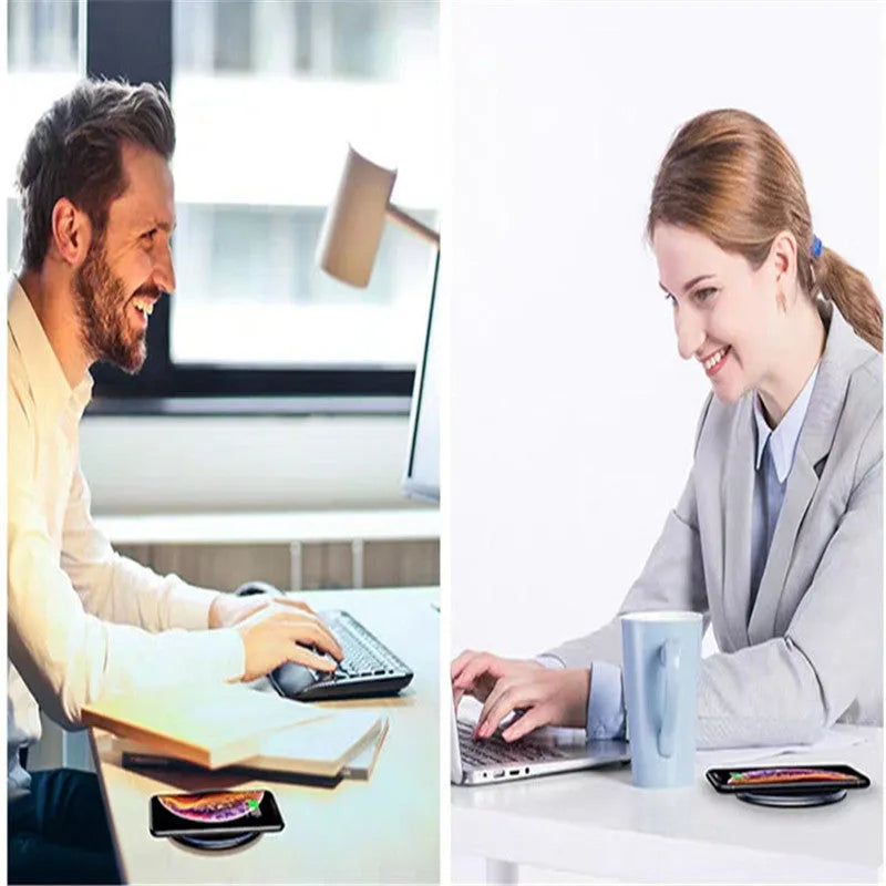Black or white aluminium alloy wireless charging pad with LED status light on desk.