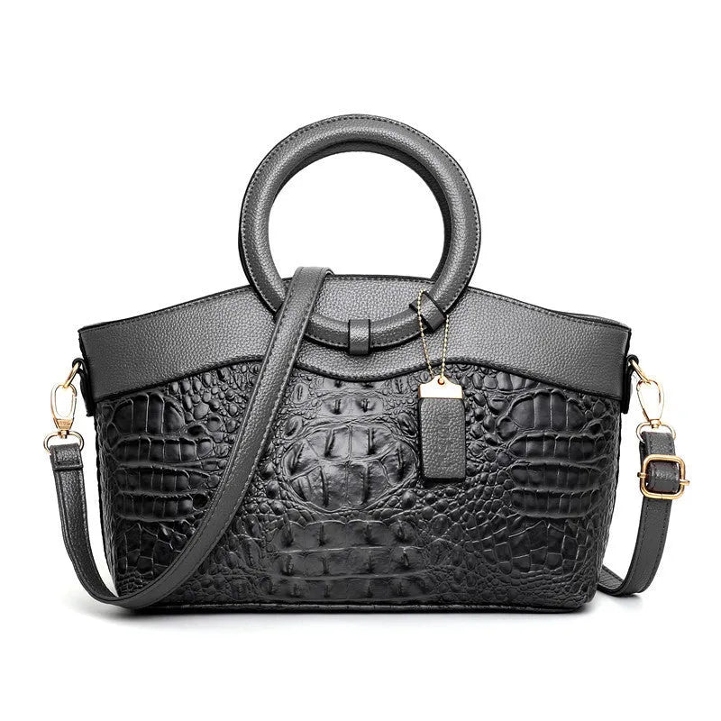 A casual fabric handbag for women in a choice of colours, showing zipper closure and internal phone pocket.