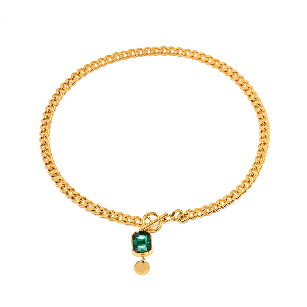 Gold retro pendant necklace with geometric round design and emerald zircon stone