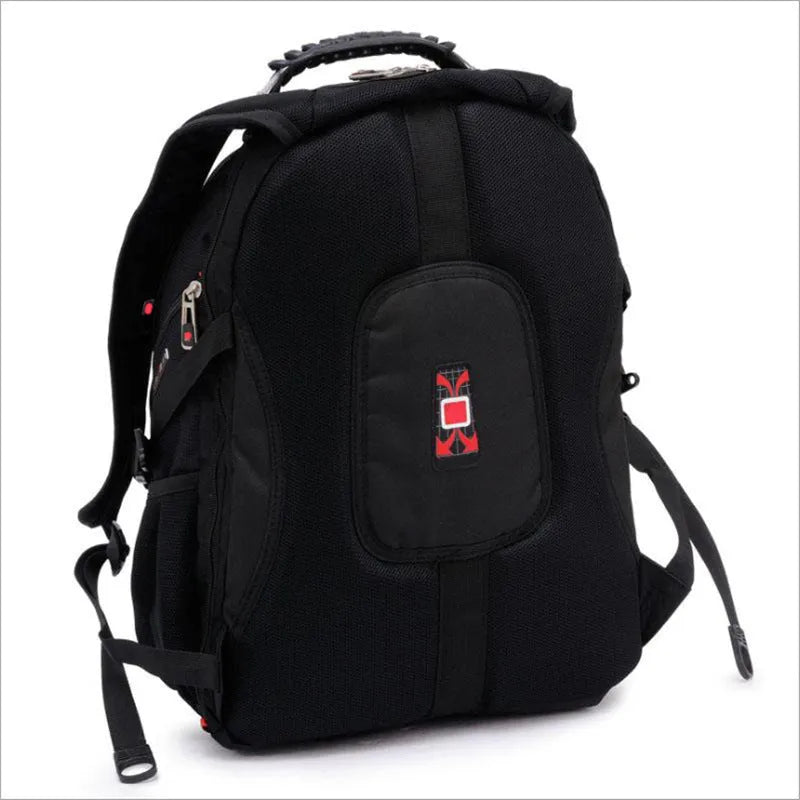 Black 38-litre business laptop backpack open to show three internal compartments and organiser pockets.