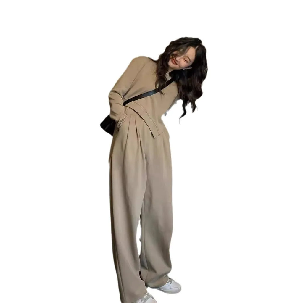 Women's casual sports suit set showing khaki coloured top and trousers with loose fit design
