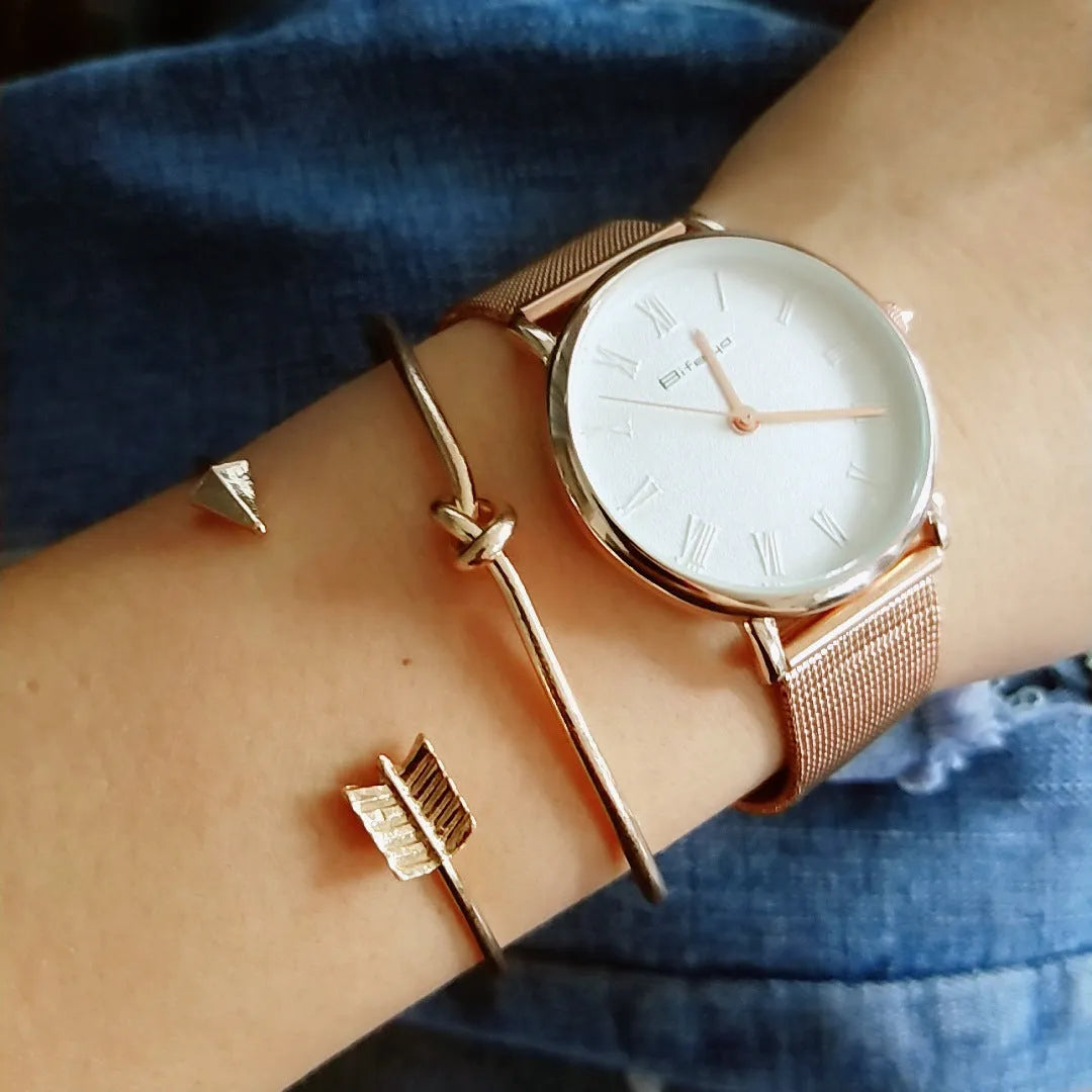 Gold electroplated women's vintage cuff bracelet with arrow knot detail