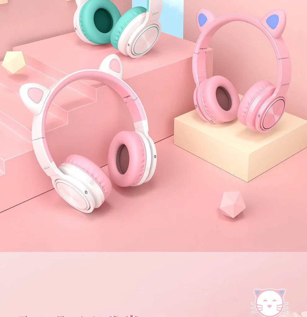 Pink-white wireless Bluetooth headset with head-mounted design and 40mm speakers