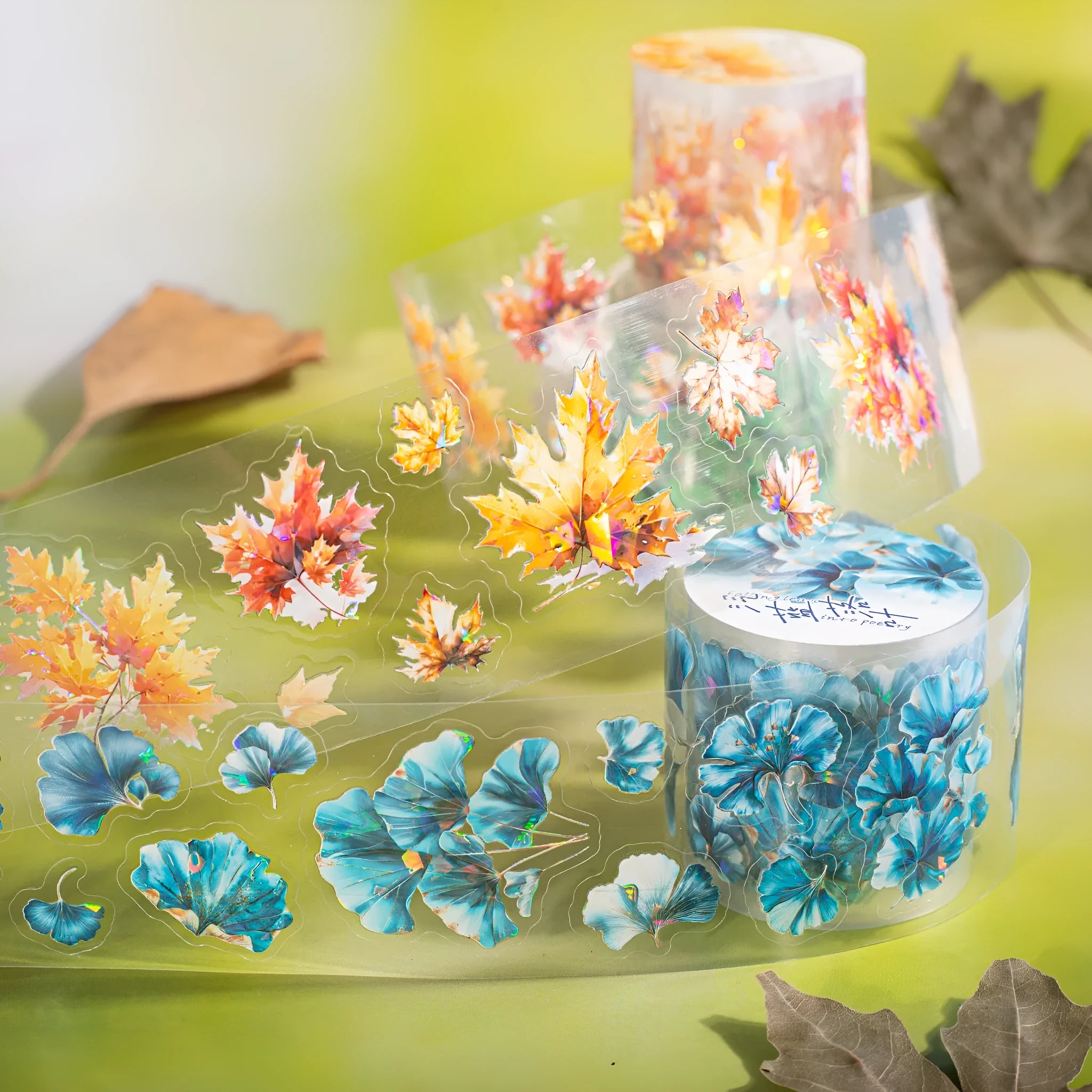 Roll of autumn leaf decorative stickers showing six colour variations including ginkgo and maple patterns