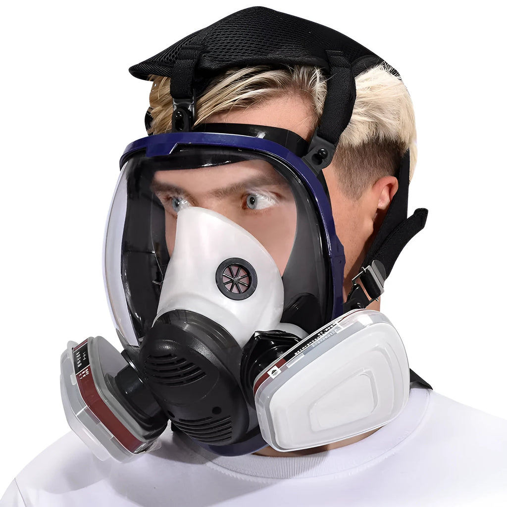 Blue-edged spherical full face gas mask with silicone construction and trapezoidal canister