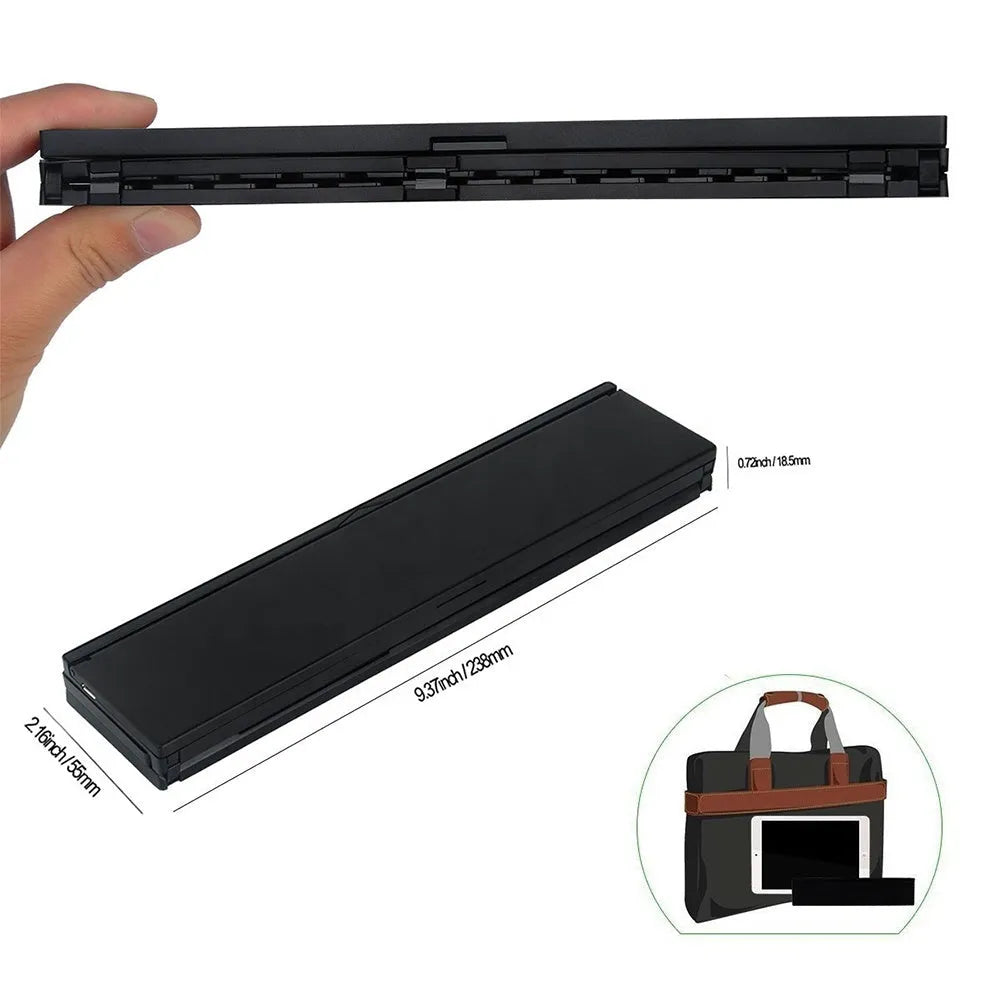 Black and white mini folding wireless Bluetooth keyboard for tablets, shown open with numeric keypad.