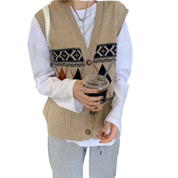 Diamond plaid pattern sleeveless cardigan top in khaki colour, laid flat.