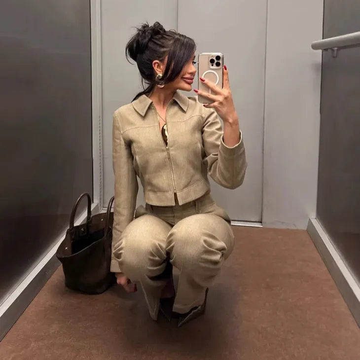 Women's herringbone pattern suit set with long sleeve jacket and straight-leg trousers