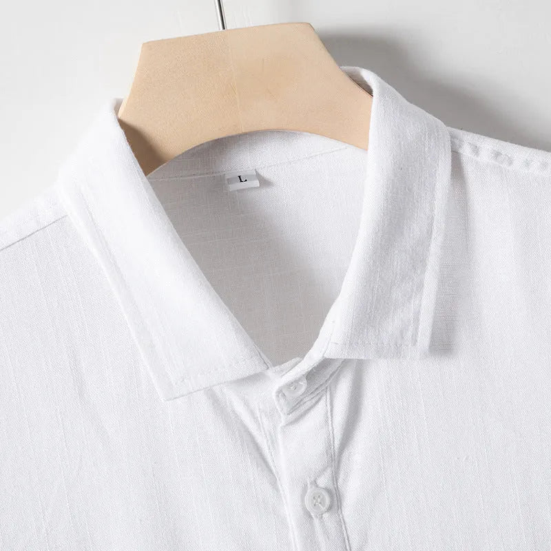 Men's loose fit linen blend T-shirt with lapel neckline and short sleeves in solid colour.