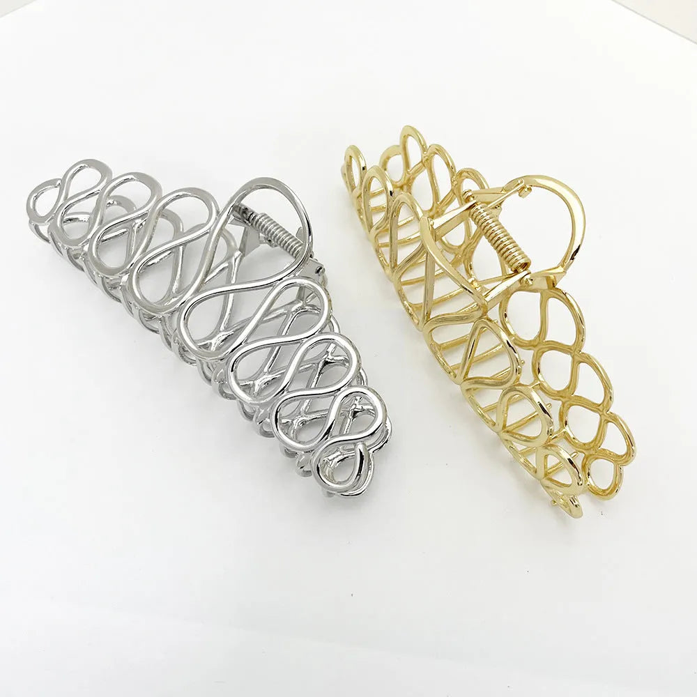Minimalist large hair clip with tassel decoration in gold electroplated alloy for updo hairstyles