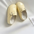 Flat casual sneakers with a buckle fastening and round toe in multiple colour options.