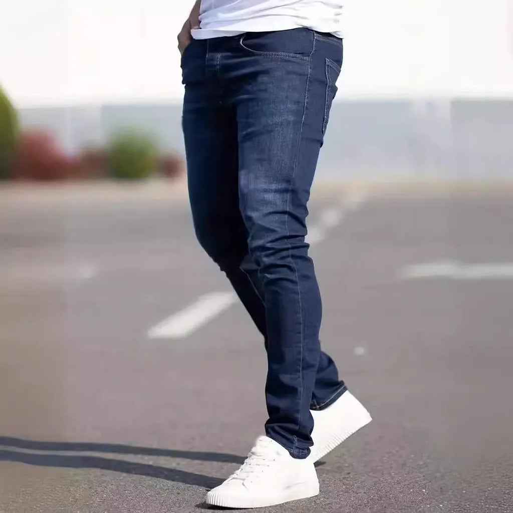 Men's dark blue slim fit casual jeans with skinny leg street fashion styling