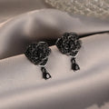Black rose zircon floral stud earrings with electroplated copper construction and 18K purity finish
