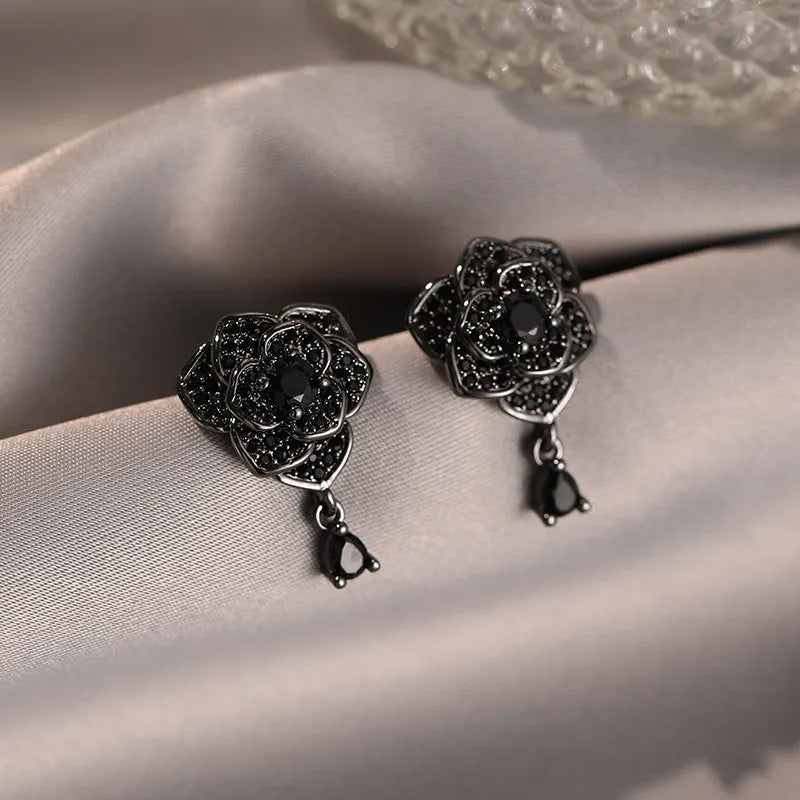 Black rose zircon floral stud earrings with electroplated copper construction and 18K purity finish