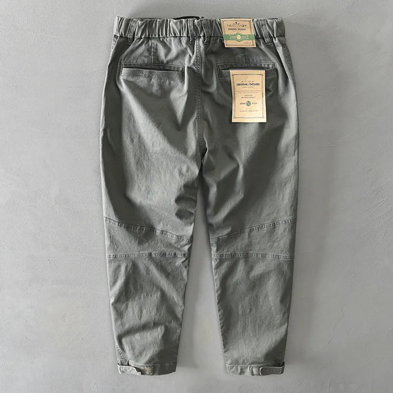 Men's loose-fit casual cotton overalls in khaki colour with an elastic waistband.