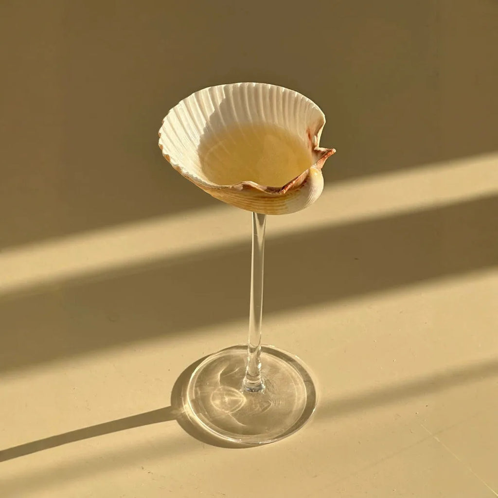 Handmade conch shell glass water cup in clear glass with novelty sea shell design, single cup