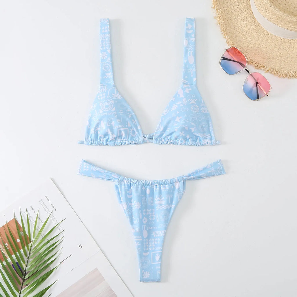 Women's floral print bikini swimsuit in blue, rose red, sky blue, or white.