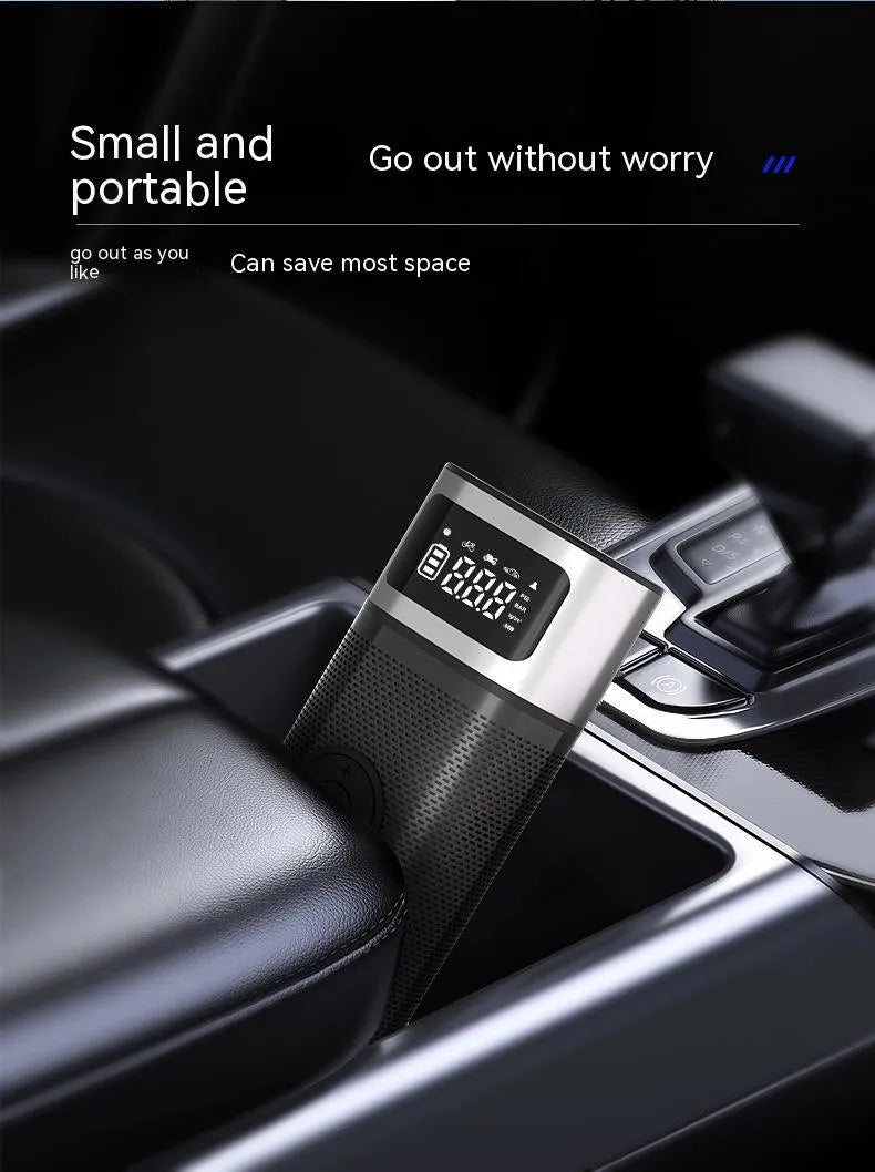 Black portable wireless vehicle air pump with 15cm tube, multiple nozzles, and USB charging cable