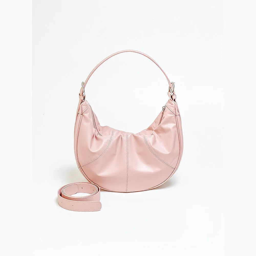 Women's soft cowhide leather dumpling-shaped shoulder bag in silver colour with double straps.