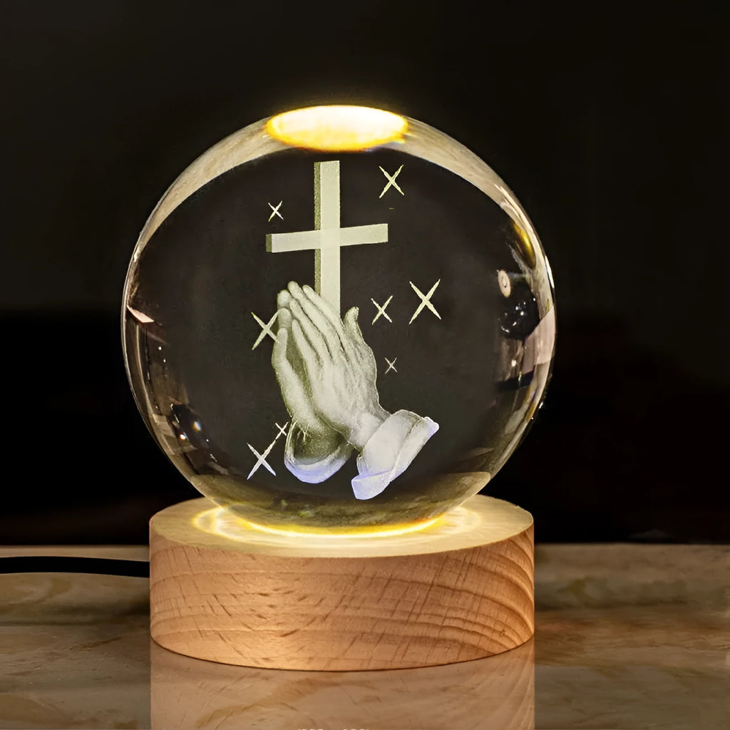 White crystal religious ornament with cross designs on 6cm ball with warm light wood base