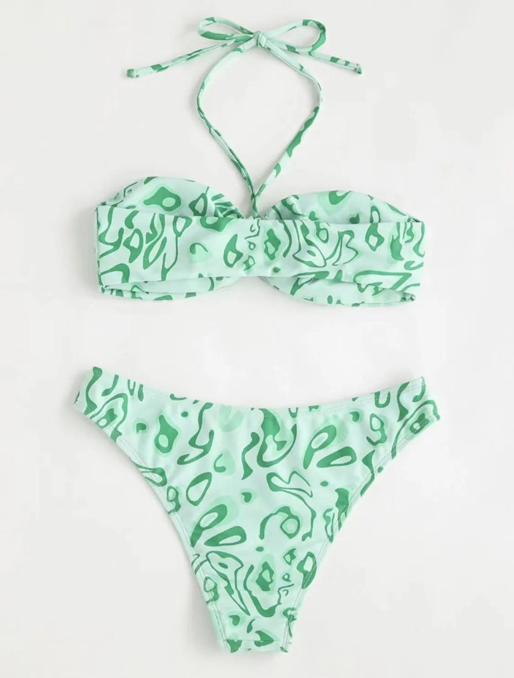 Green floral bandeau bikini swimsuit with split style bottom and backless design on mannequin