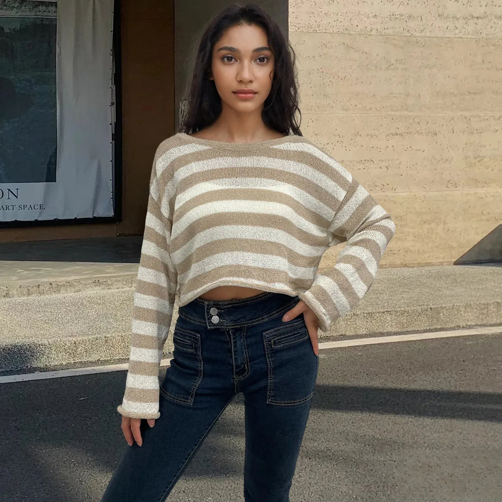 Striped long-sleeved sweater with front and back wearable design and exposed navel detail.