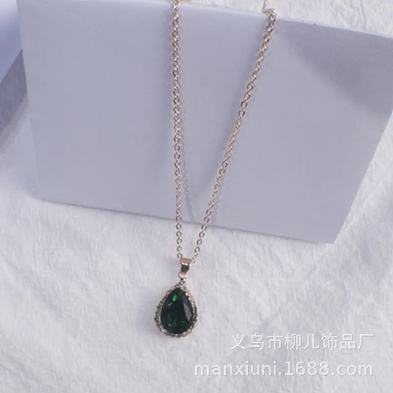 Rose gold water drop necklace with geometric rhinestone pattern in pink colour