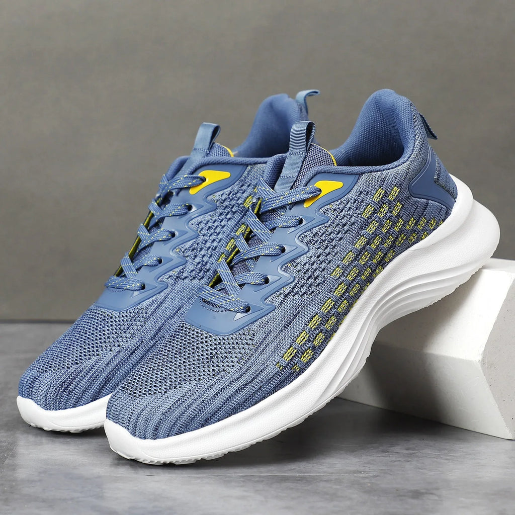 Women's lavender purple Flyknit running shoes with striped pattern and mesh upper on a white background.