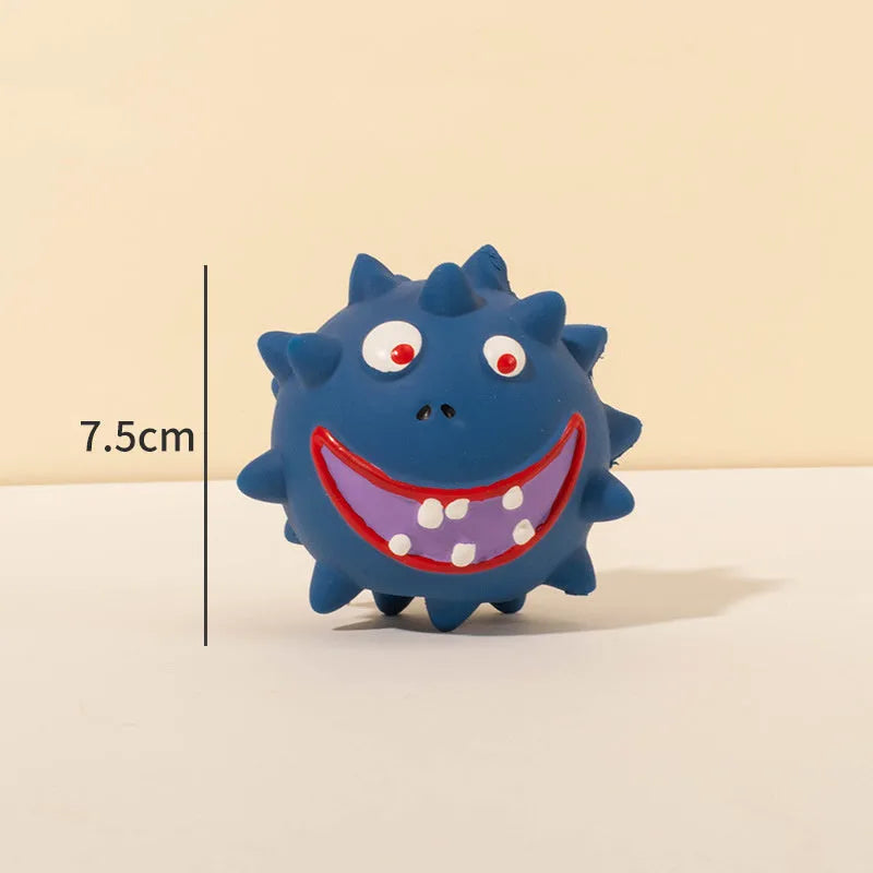 Set of four colourful natural latex rubber dog balls with cute faces and bumpy texture
