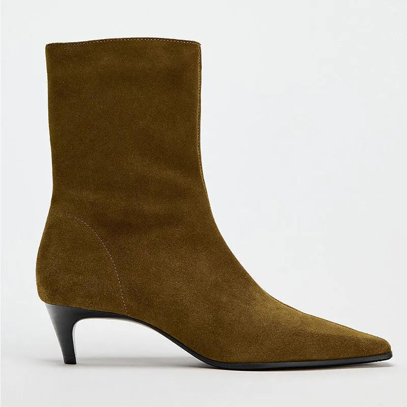 Brown women's square toe ankle boots with side zip and stiletto heel on a waterproof platform sole