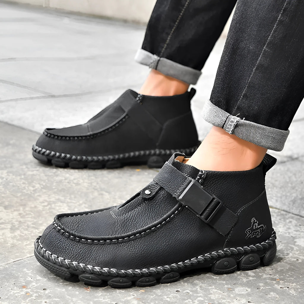 Men's black handmade stitched PU leather casual slip-on loafers with a flat sole.