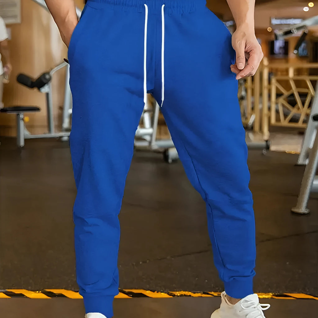 Men's linen leisure trousers with elastic drawstring waist in thin polyester fabric, loose fit design