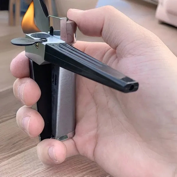 Silver foldable metal pipe lighter shown open, revealing lighter mechanism and small storage compartment.